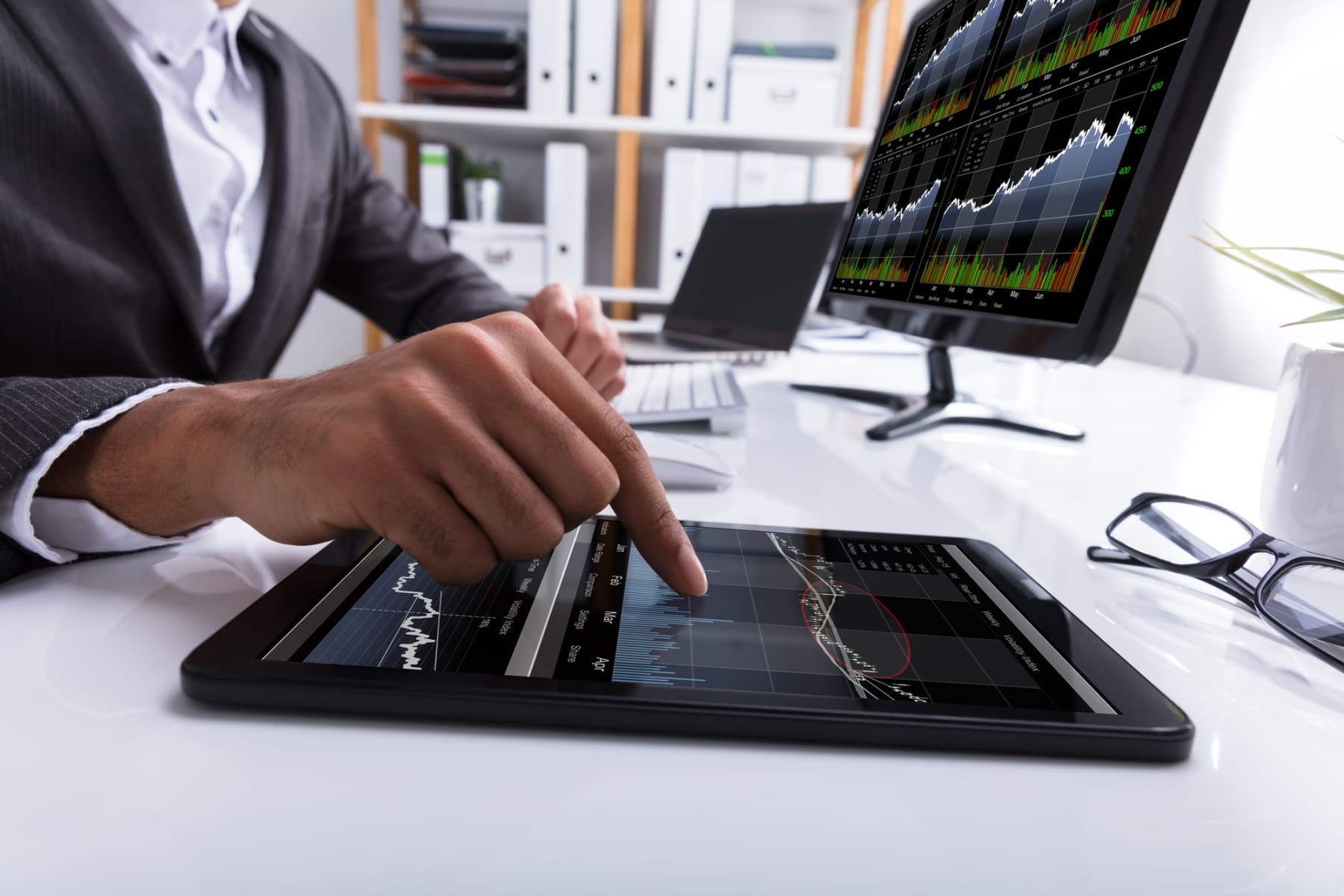 Trader Behind Desk